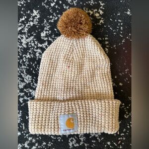 Carhartt Women's Knit Pom-Pom Cuffed Beanie in a light khaki heather nep color